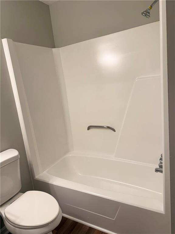 3990 Highway 92 Acworth, GA 30102 - Photo 14 of 25 a white toilet sitting next to a bath tub