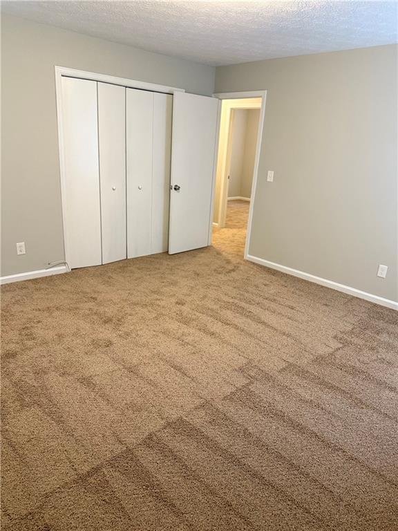 3990 Highway 92 Acworth, GA 30102 - Photo 15 of 25 a view of an empty room and wooden floor
