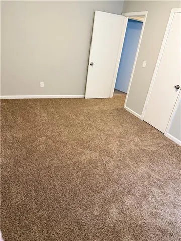 an empty room with an entryway