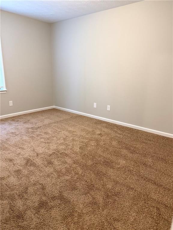 3990 Highway 92 Acworth, GA 30102 - Photo 21 of 25 an empty room with natural light
