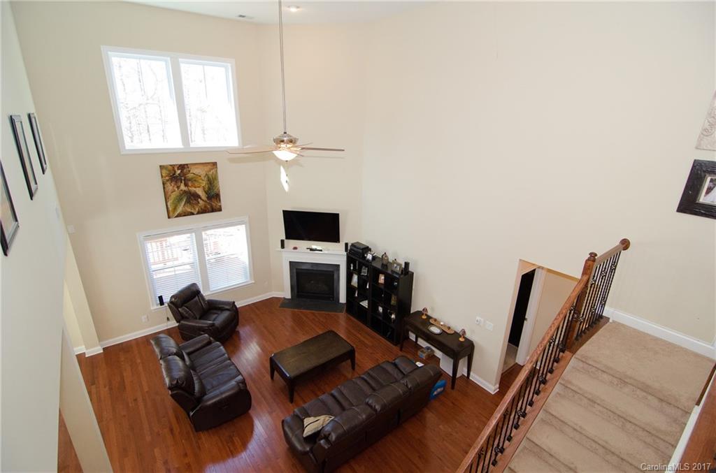 16827 Rudence Court Charlotte, NC 28278 - Photo 14 of 24 a view of a workspace with furniture and a window
