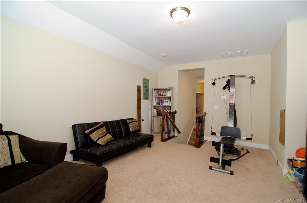 16827 Rudence Court Charlotte, NC 28278 - Photo 19 of 24 a view of a room with gym equipment