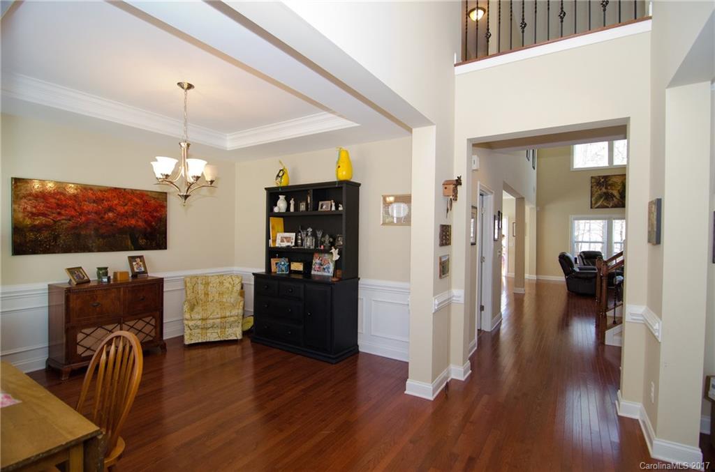 16827 Rudence Court Charlotte, NC 28278 - Photo 4 of 24 a living room with furniture and a flat screen tv