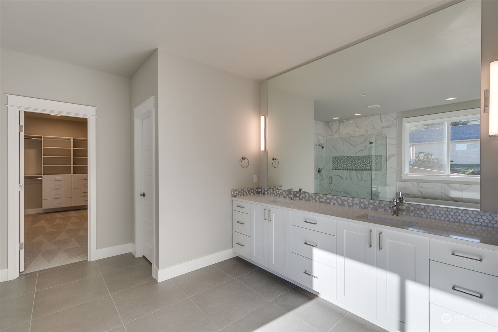 23208 15th Avenue Southeast Bothell, WA 98021 - Photo 18 of 28 a bathroom with a granite countertop sink mirror and double