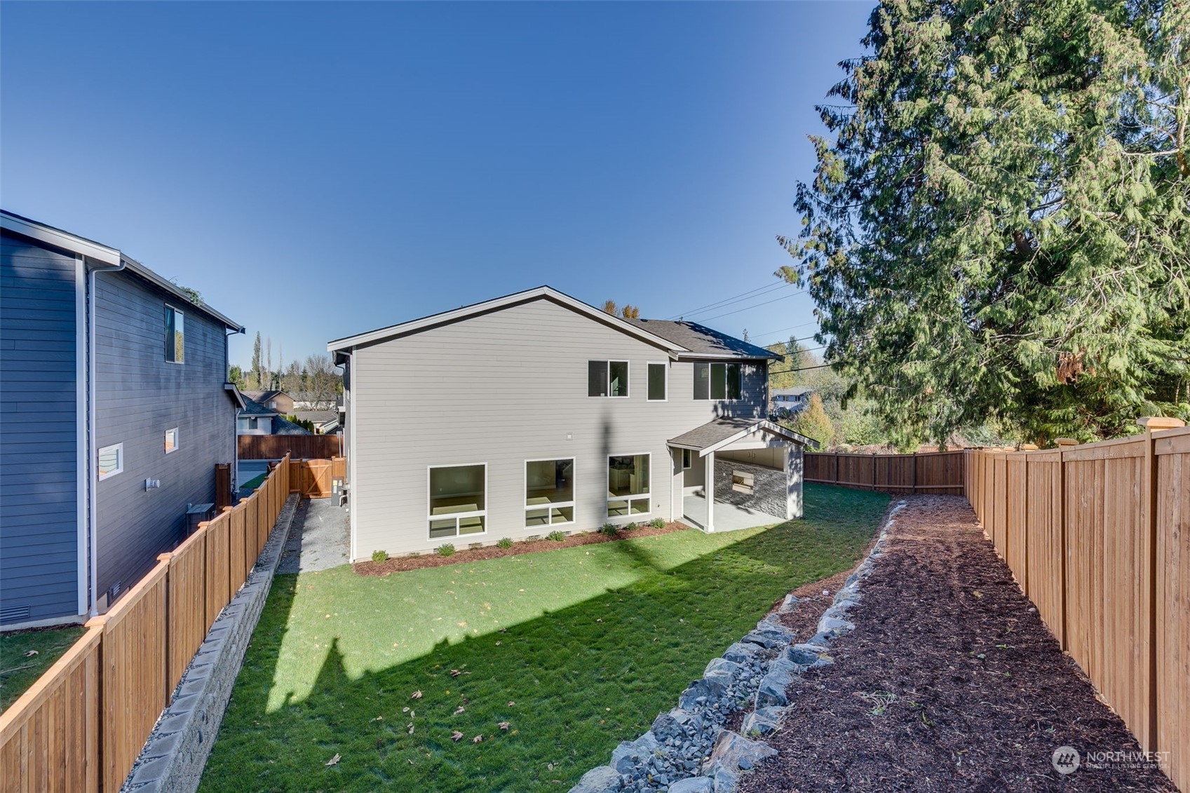 23208 15th Avenue Southeast Bothell, WA 98021 - Photo 25 of 28 a view of house with garden and deck