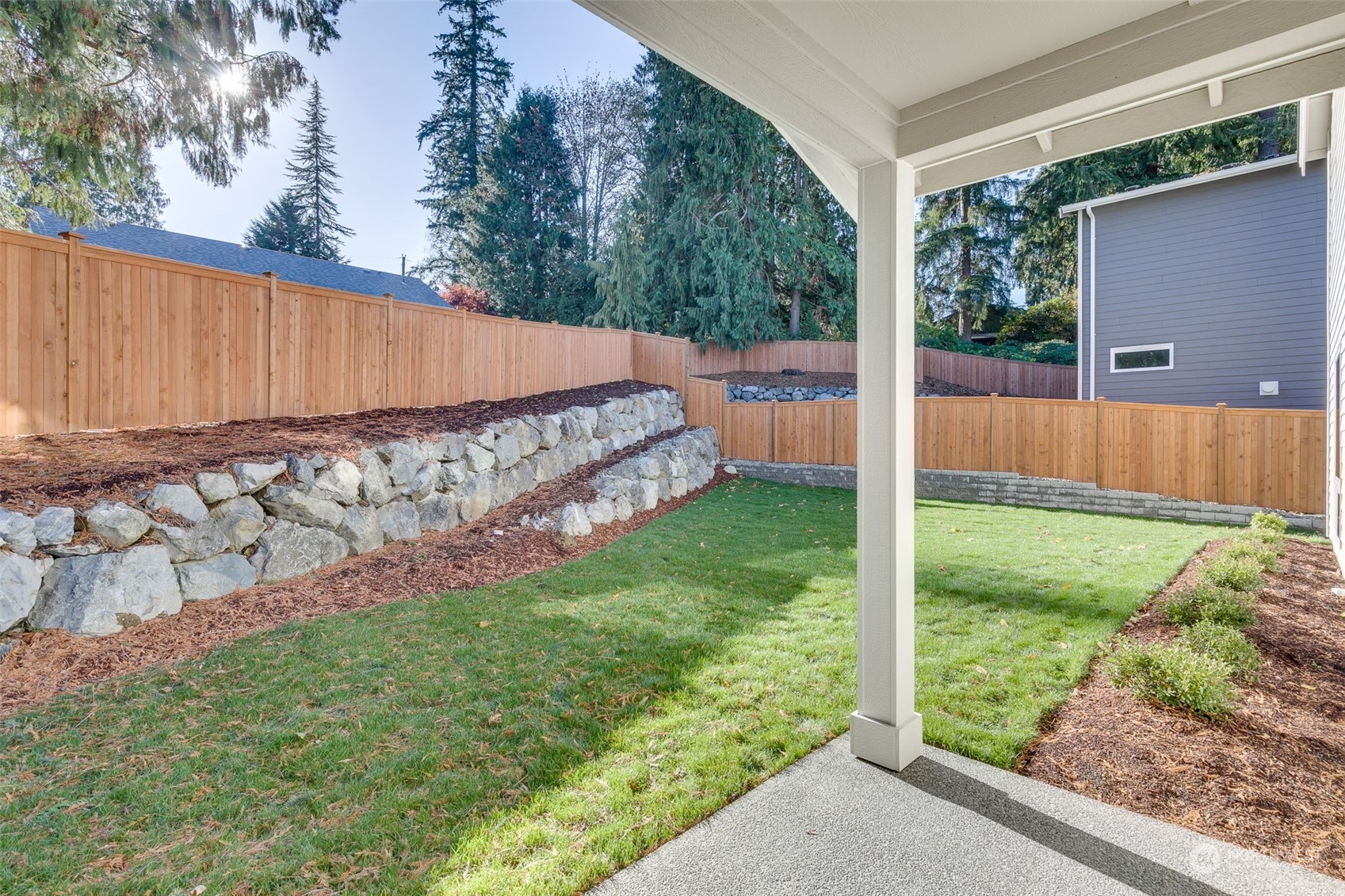 23208 15th Avenue Southeast Bothell, WA 98021 - Photo 26 of 28 a view of a backyard with a garden