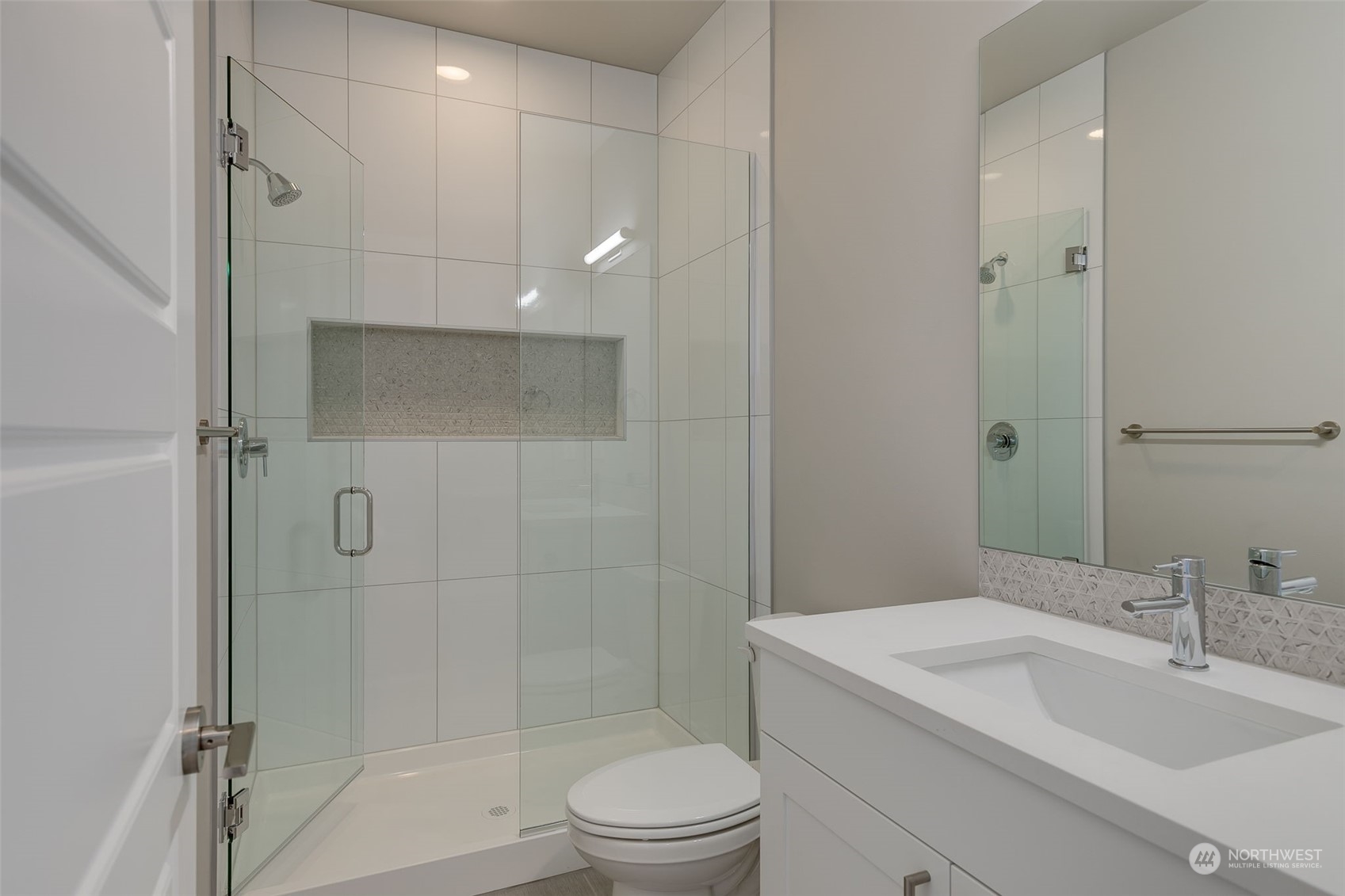 23208 15th Avenue Southeast Bothell, WA 98021 - Photo 5 of 28 a bathroom with a sink toilet and shower
