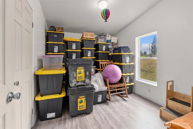 a room with furniture and gym equipment