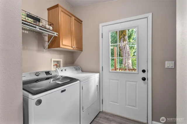 a kitchen that has a sink and a stove