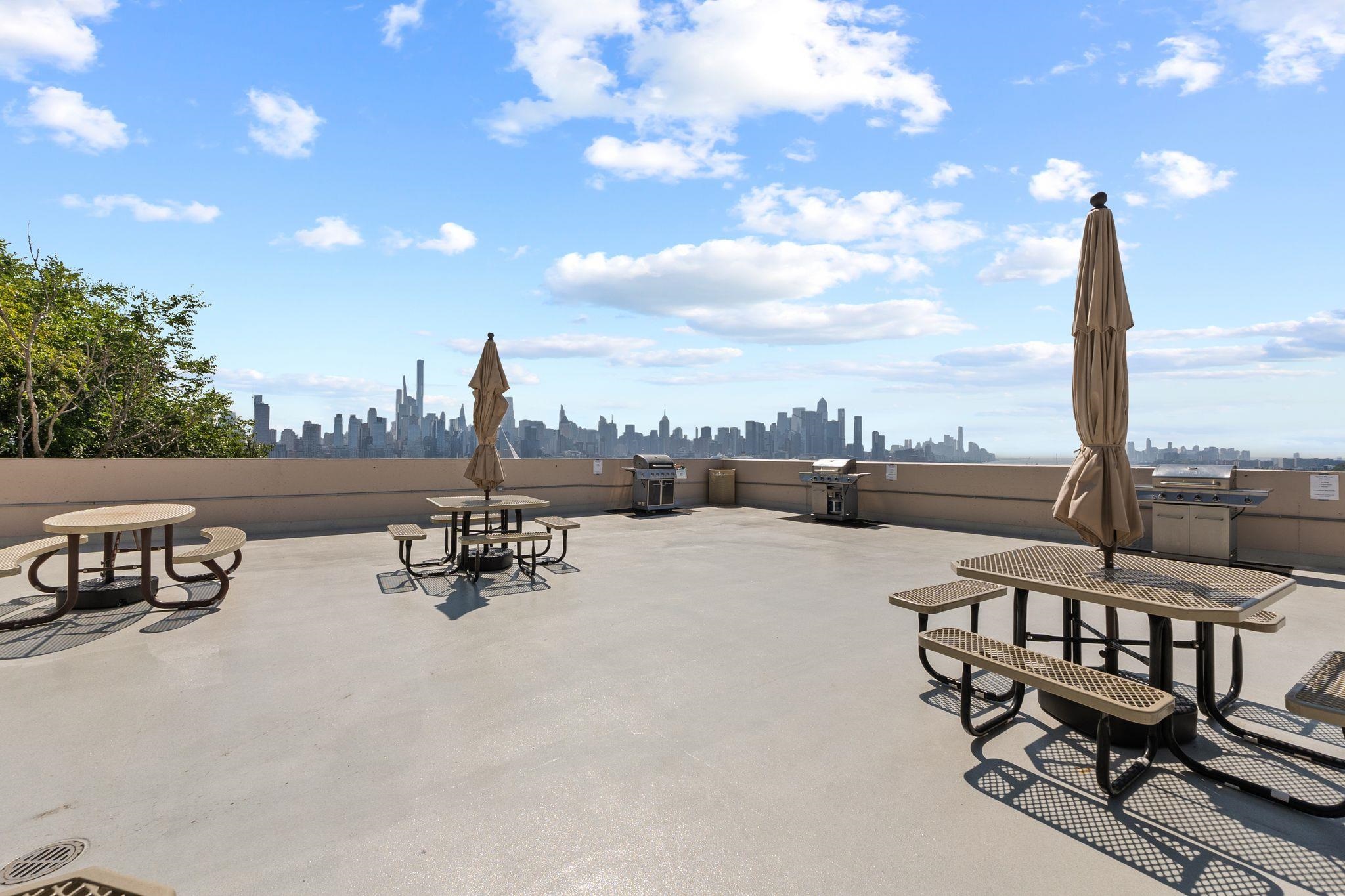 6040 Boulevard East, Unit 14F West New York, NJ 07093 - Photo 26 of 34 a view of a terrace with sitting area