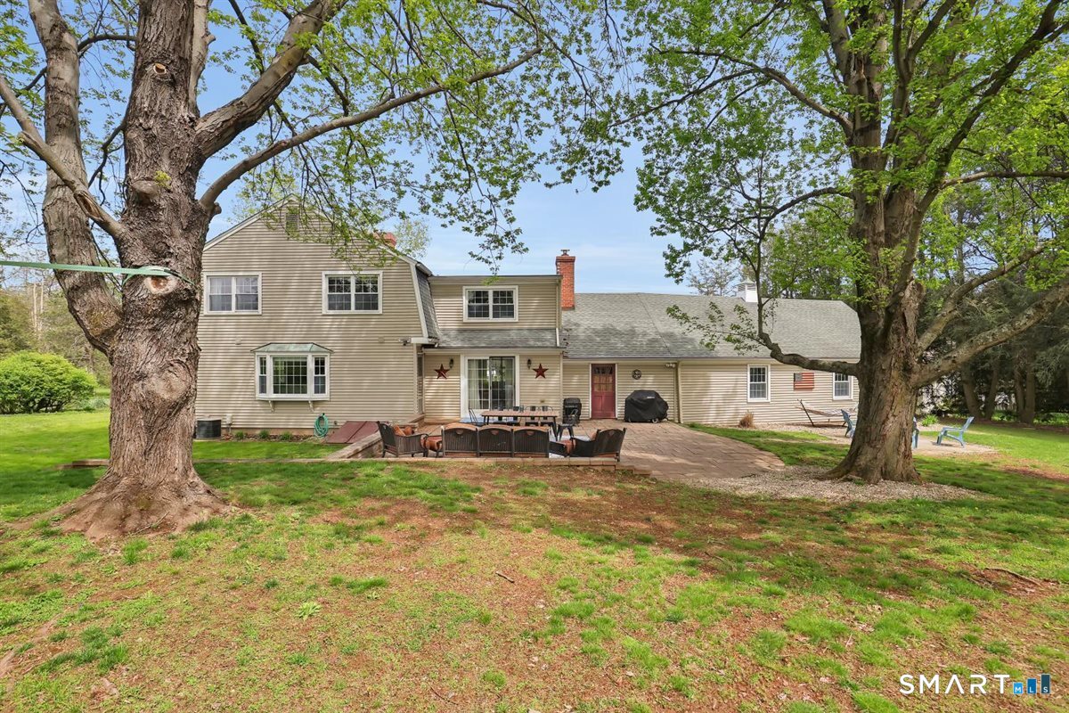 72 Old Post Road Wethersfield, CT 06109 - Photo 33 of 40 a view of a house with a yard