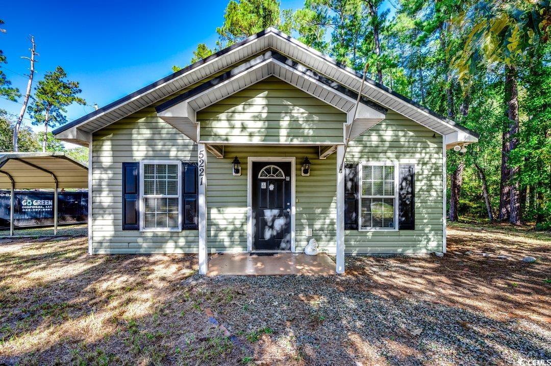 5221 Bottle Branch Road Conway, SC 29527 - Photo 1 of 16 View of front of home featuring covered porch and