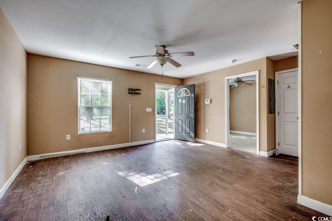 5221 Bottle Branch Road Conway, SC 29527 - Photo 4 of 16 Empty room featuring dark hardwood / wood-style fl