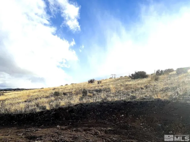 a view of a lake next to a building