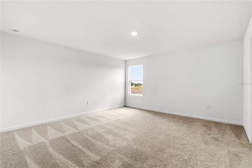 3644 Rolling Rdg Bend Davenport, FL 33837 - Photo 13 of 31 a view of an empty room and window