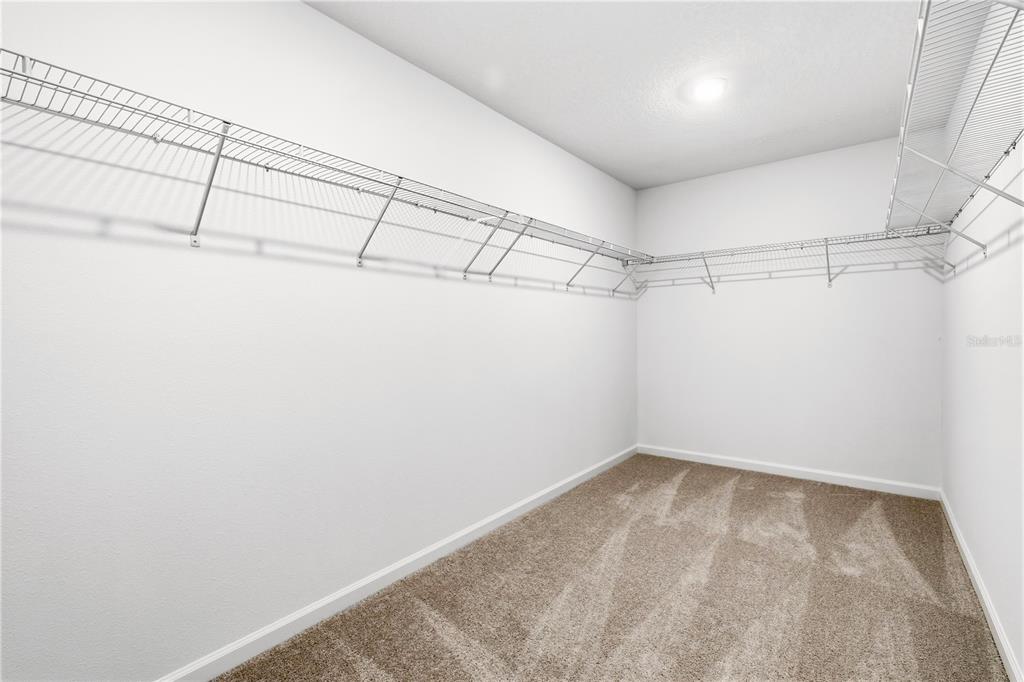 3644 Rolling Rdg Bend Davenport, FL 33837 - Photo 16 of 31 a view of a room with racks on the wall