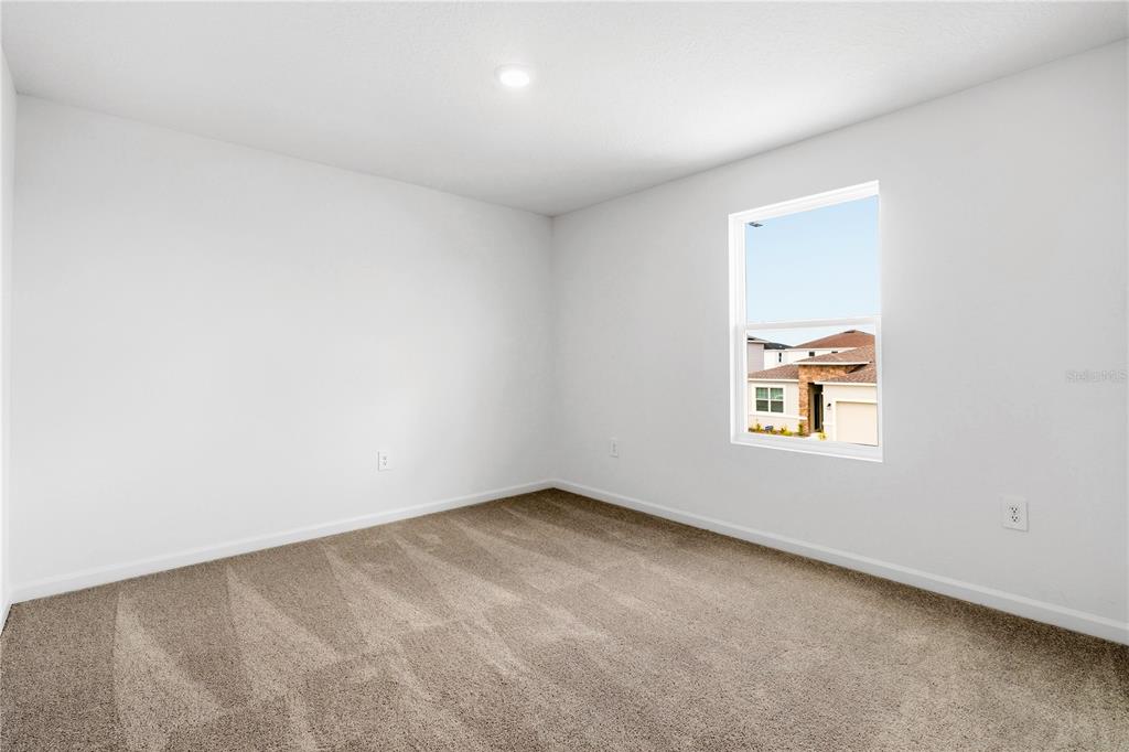 3644 Rolling Rdg Bend Davenport, FL 33837 - Photo 23 of 31 an empty room with windows