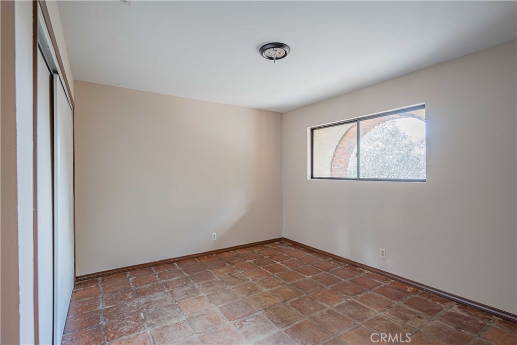 48703 De Luz Road Temecula, CA 92590 - Photo 26 of 36 an empty room with windows