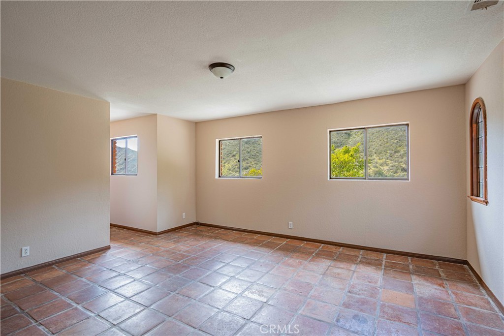 48703 De Luz Road Temecula, CA 92590 - Photo 30 of 36 a view of an empty room with a window