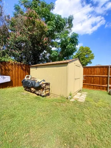 a view of street with parked cars