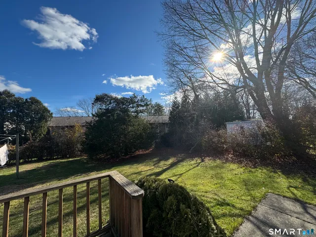a view of swimming pool from a balcony