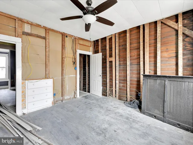 a view of a hallway with closet area