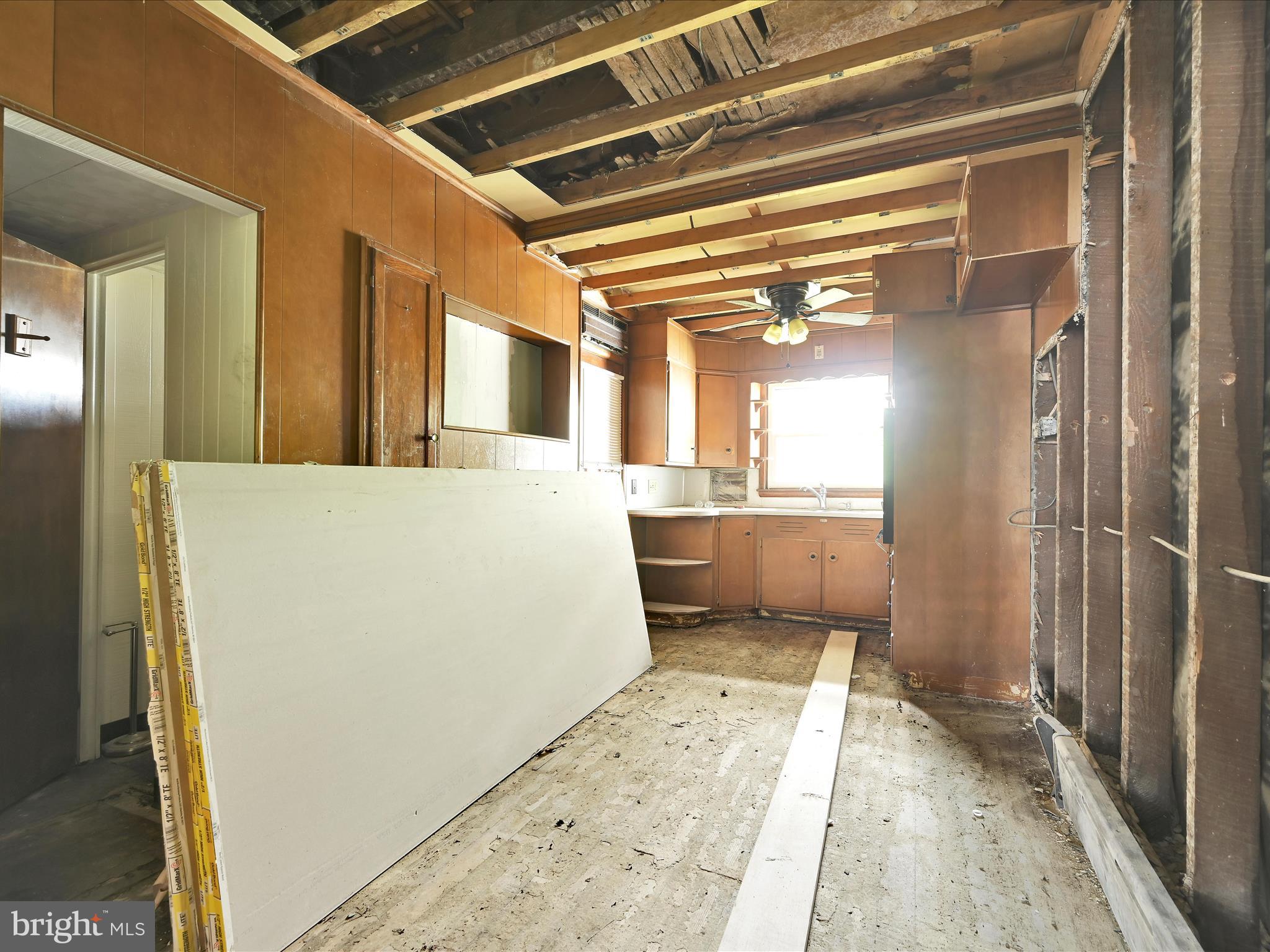 427 East Centre Street Mahanoy City, PA 17948 - Photo 22 of 29 a view of kitchen and hall with wooden floor