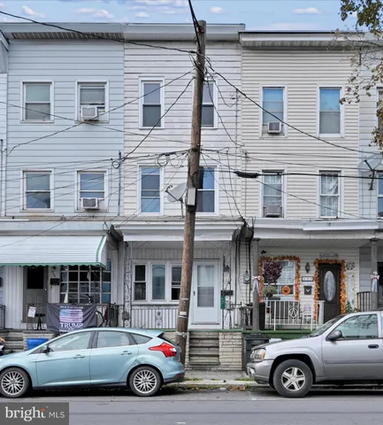 a car parked in front of a building