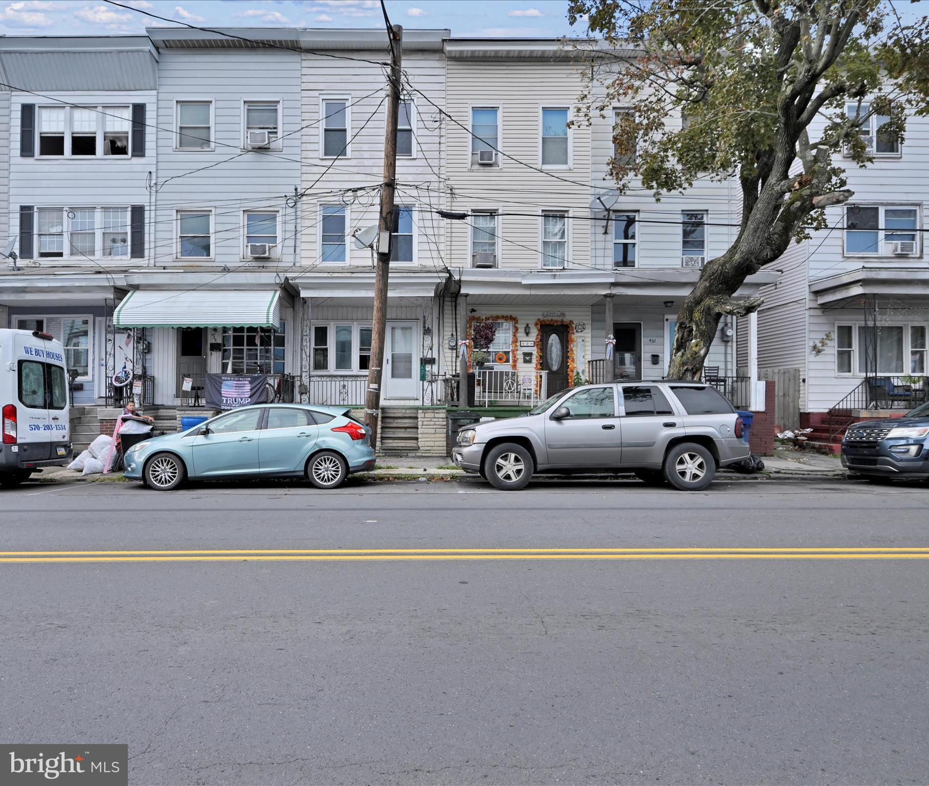 427 East Centre Street Mahanoy City, PA 17948 - Photo 5 of 29 a car parked in front of a building