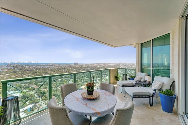 a bed room with a bed and a large window