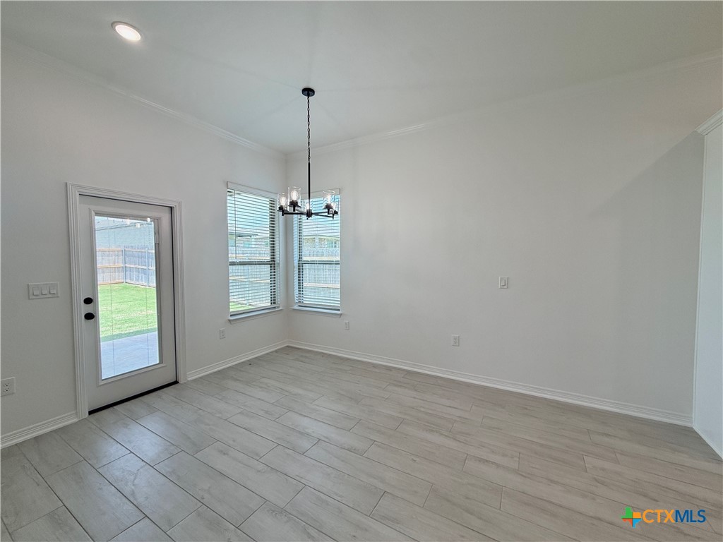 2016 Yarrow Road Temple, TX 76502 - Photo 20 of 30 a view of empty room with wooden floor and fan