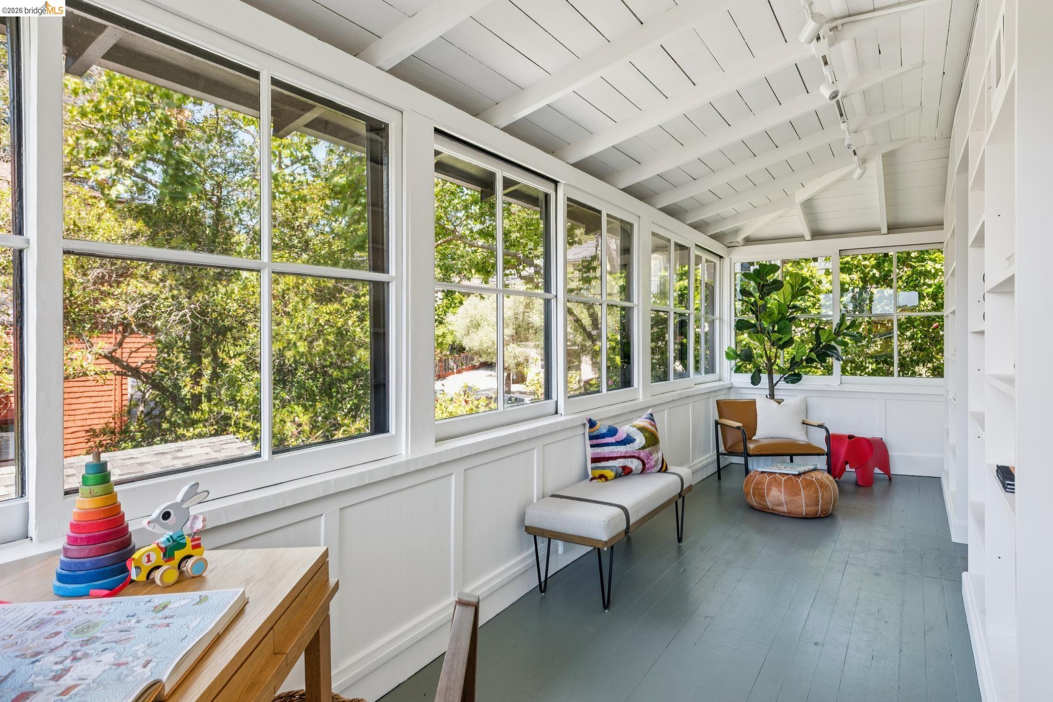 1490 Arch Street Berkeley, CA 94708 - Photo 35 of 57 a bedroom with furniture and a large window