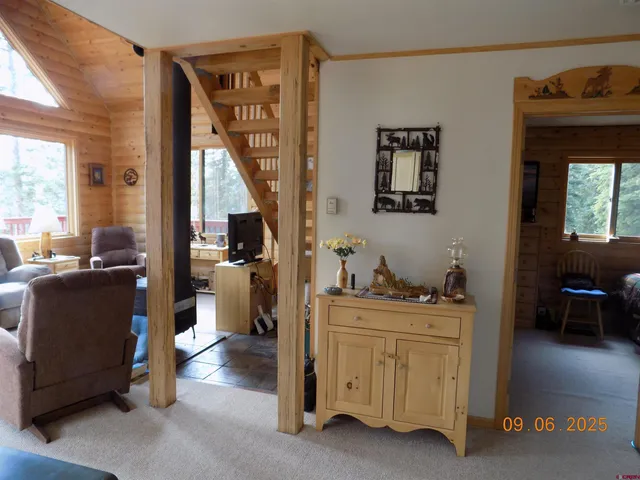 a view of room with cabinets and furniture