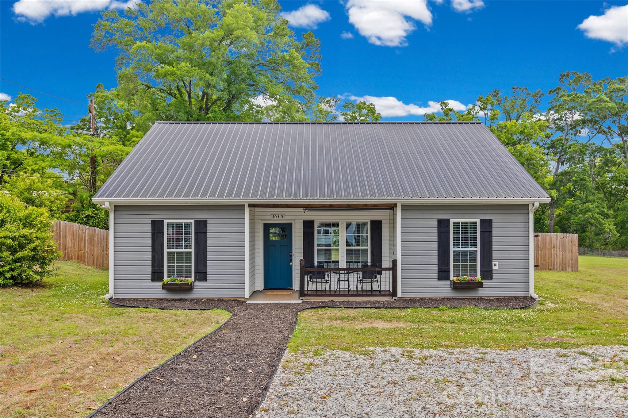 103.5 Foote Street Chester, SC 29706 - Photo 1 of 22 a view of a house with garden and deck