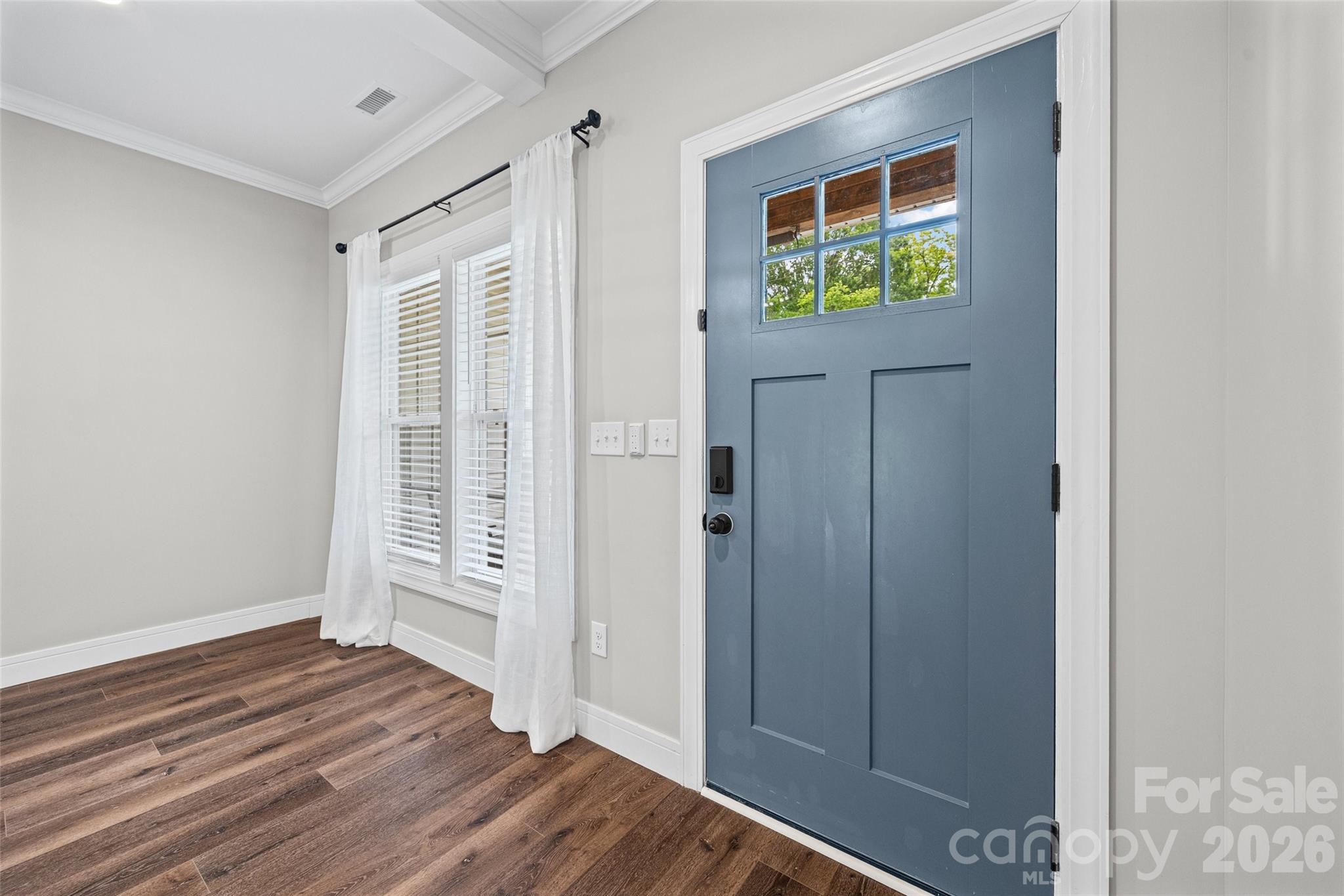 103.5 Foote Street Chester, SC 29706 - Photo 3 of 22 a view of entryway with wooden floor