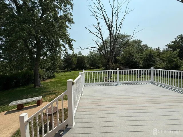 a balcony view with a garden