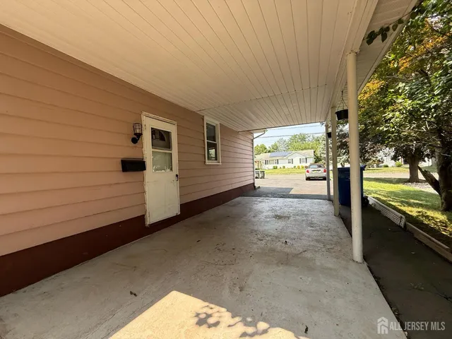a view of a porch with furniture