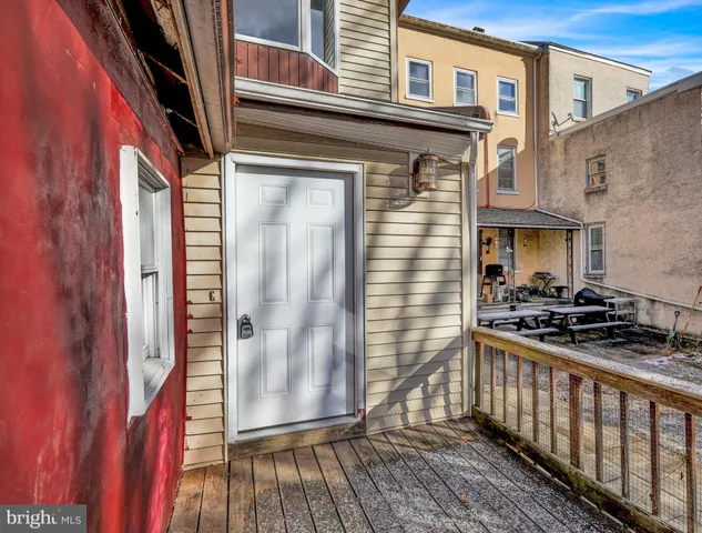 a view of a brick house with a door