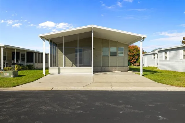 a house with yard in front of it