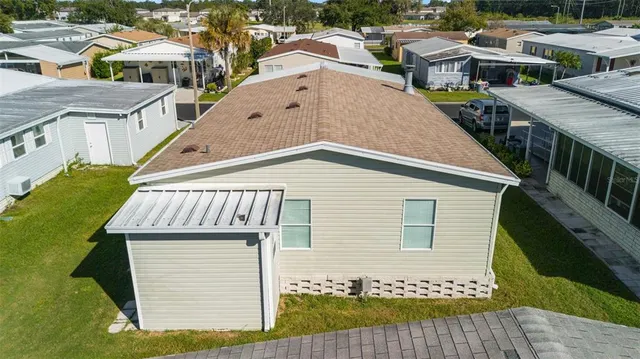 a front view of residential houses with yard