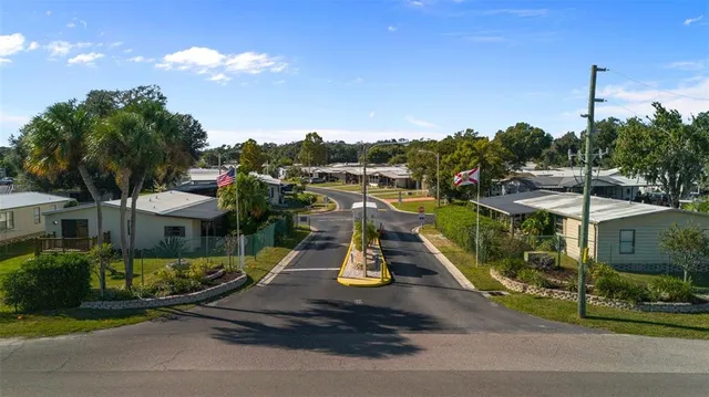 a view of a park with swings and slides