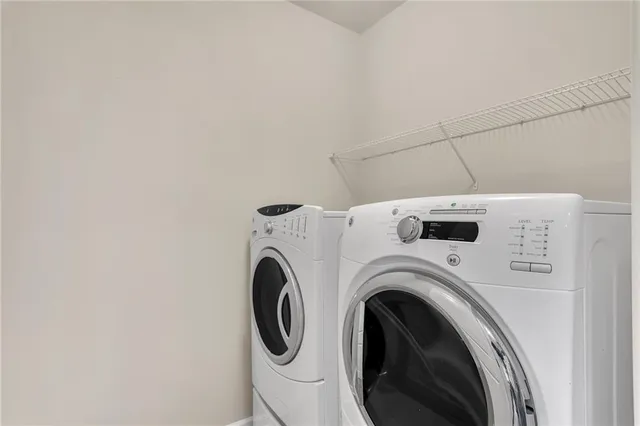 a utility room with dryer and washer
