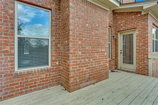 a view of front door of house with stairs