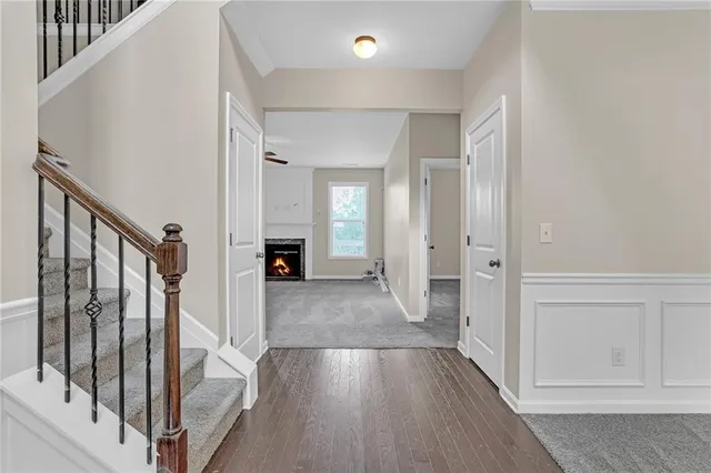 a view of a hallway view with staircase