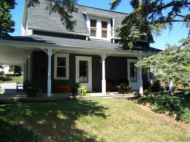 1425 North Brookside Road Lower Macungie Township, PA 18106 - Photo 1 of 31 a view of a building with a yard