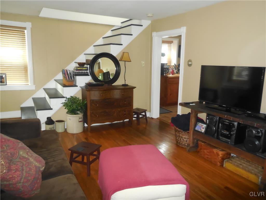 1425 North Brookside Road Lower Macungie Township, PA 18106 - Photo 11 of 31 a living room with furniture and a flat screen tv