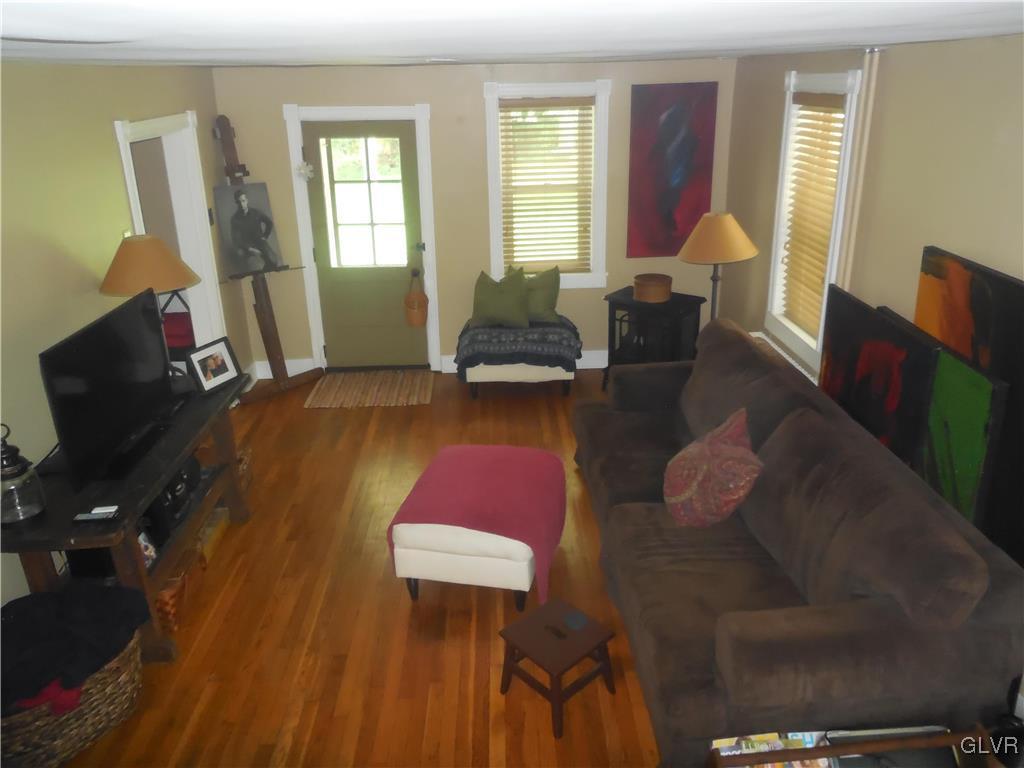 1425 North Brookside Road Lower Macungie Township, PA 18106 - Photo 13 of 31 a living room with furniture and a window