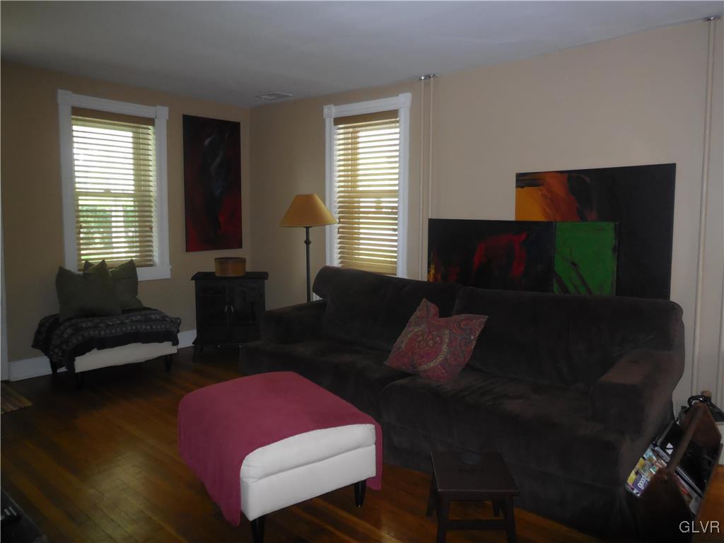 1425 North Brookside Road Lower Macungie Township, PA 18106 - Photo 15 of 31 a living room with furniture and a flat screen tv
