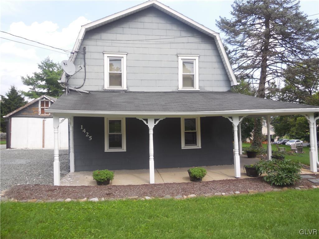 1425 North Brookside Road Lower Macungie Township, PA 18106 - Photo 2 of 31 a view of front of a house with a yard