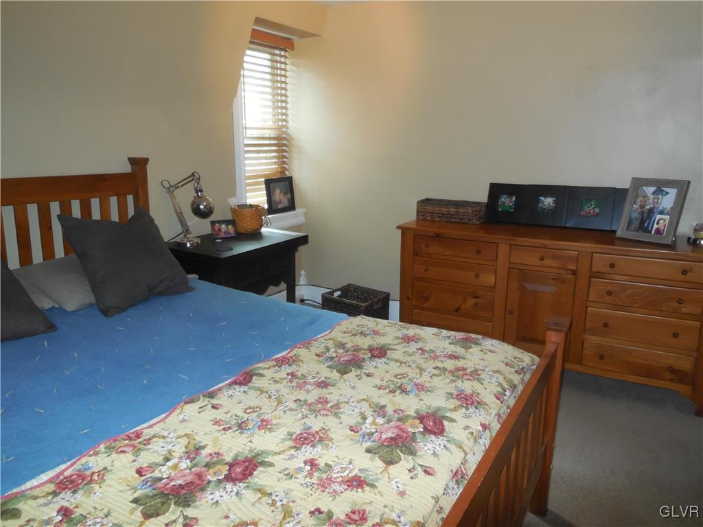 1425 North Brookside Road Lower Macungie Township, PA 18106 - Photo 21 of 31 a bedroom with a bed and window
